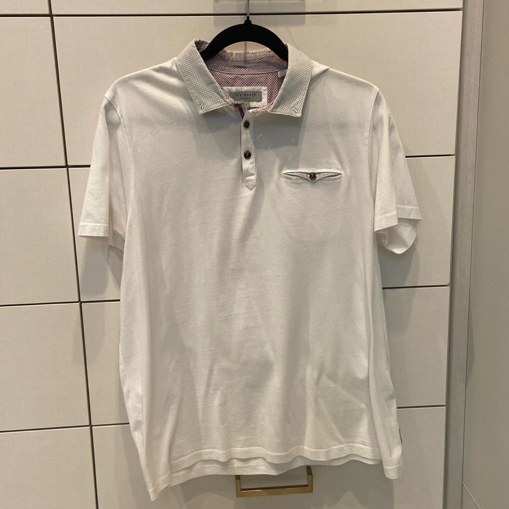 This is a Ted Baker London in a size large. It is white and is in great shape!